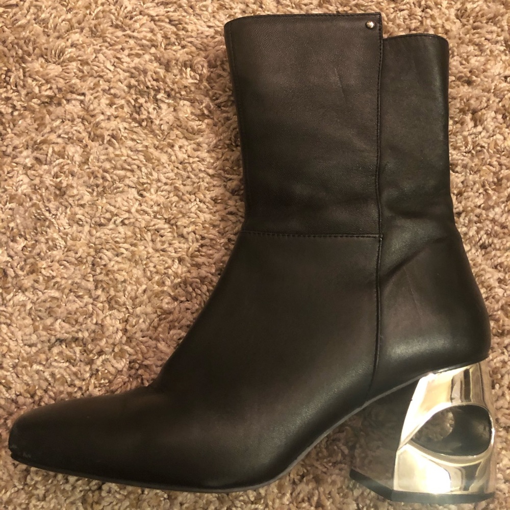 Black designer heel leather boots